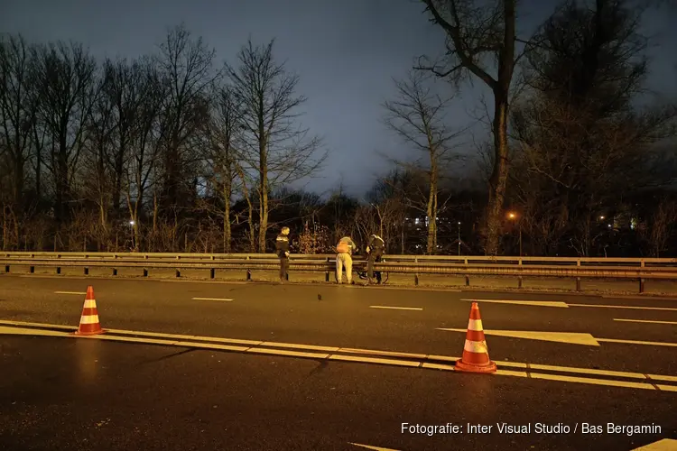 Waaghals op de fiets uit Velsertunnel geplukt